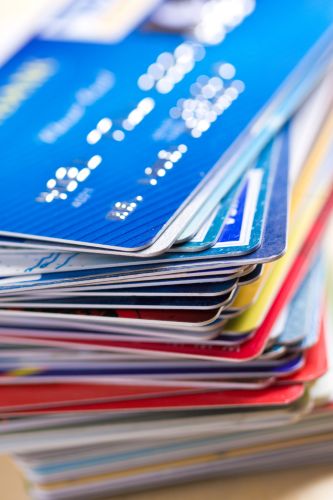 a stack of plastic payment cards